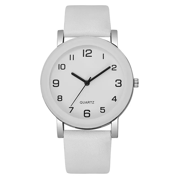 Montre minimaliste pour femme ou homme, bracelet cuir et cadran épuré. Livraison prioritaire offerte !
