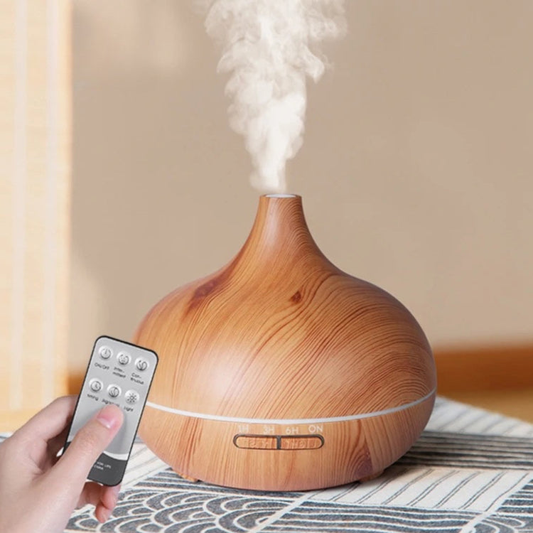 Magnifique diffuseur d'huiles essentielles 550 ml, modèle élégant, avec minuterie, arrêt automatique, brume ultrasonique, lumières LED 7 couleurs apaisantes et télécommande pour bien-être et relaxation. La livraison prioritaire est offerte !