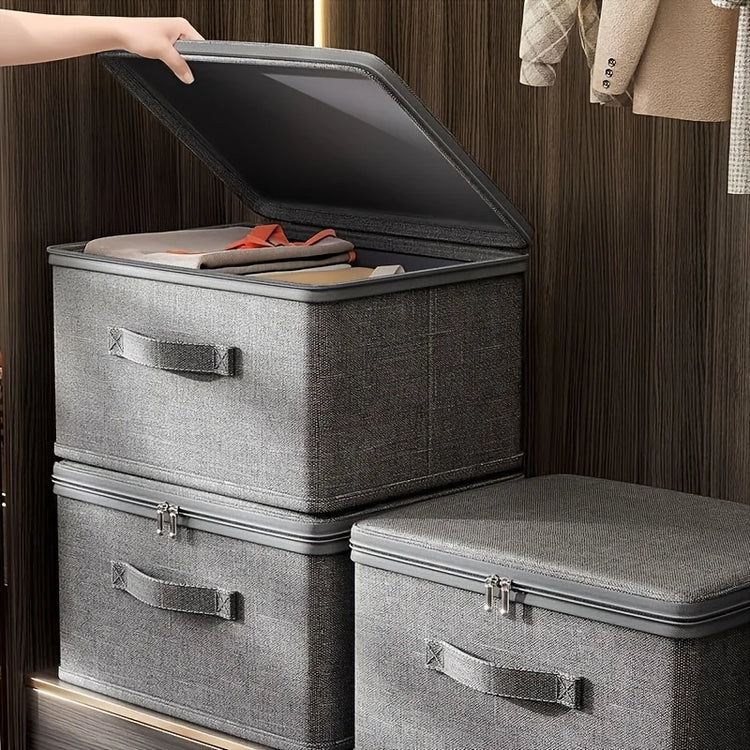 Boîte de rangement pliable multifonctionnelle en tissu imperméable avec couvercle zippé à double sens, grande capacité pour vêtements, couettes, oreillers, solution gain de place et protection optimale. Livraison offerte !