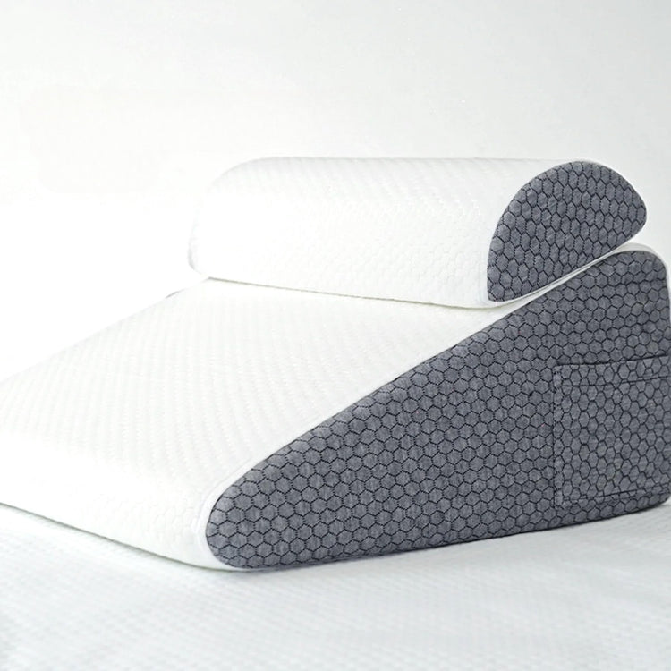 Coussin-triangle 4-en-1 Premium : Soulage efficacement les tensions aux jambes, offre un soutien ergonomique et un confort ultime. La livraison prioritaire est offerte !
