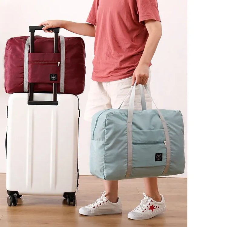 Sac de voyage pliable 25 L – Ultra-léger, imperméable, grande capacité, rangement compact, idéal cabine avion, week-end, sport, plage, shopping – Fixation sur valise. Livraison offerte !
