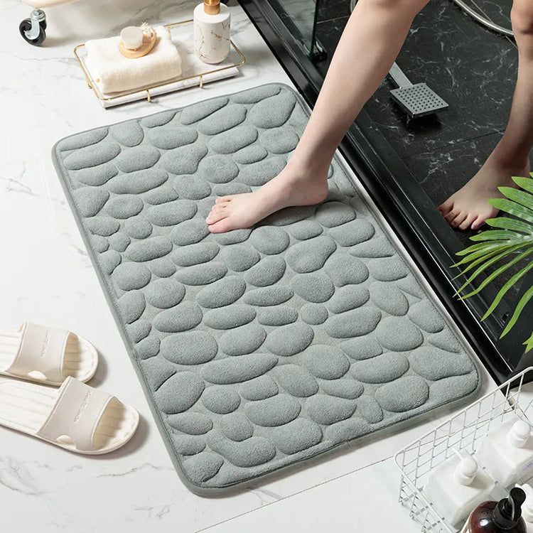 Superbe tapis de bain antidérapant en mousse à mémoire de forme, ultra confortable et douillet, lavable en machine. La livraison est offerte!